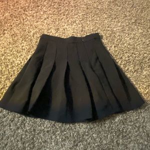 Pleated black skirt, never worn.